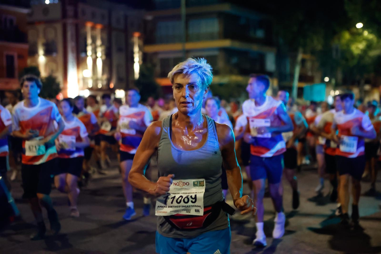 Búscate en la galería de imágenes de ABC de la Carrera Nocturna de Sevilla 2025