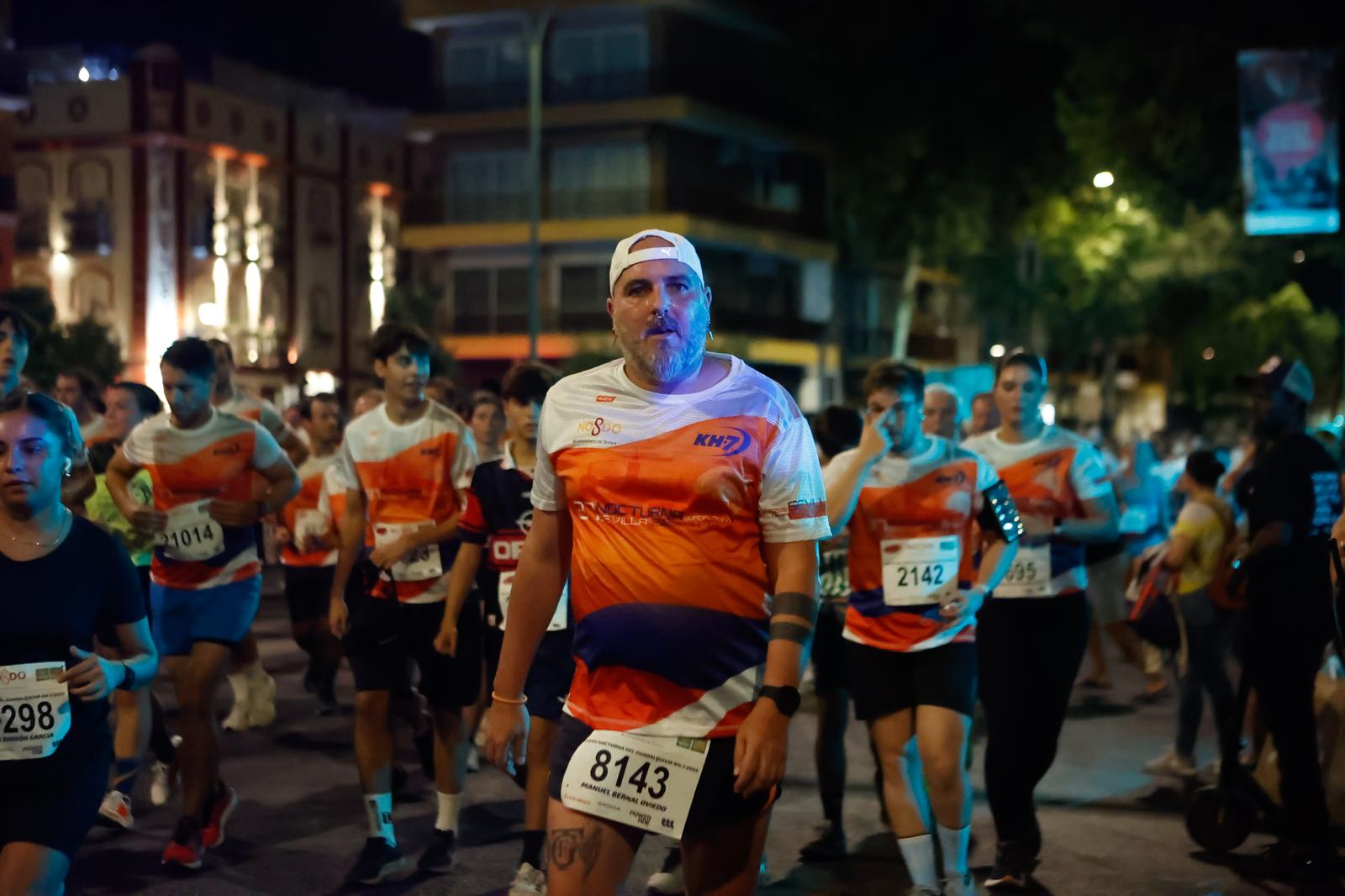 Búscate en la galería de imágenes de ABC de la Carrera Nocturna de Sevilla 2025