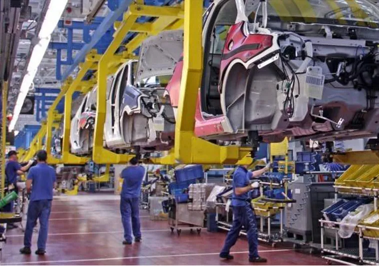 Cadena de montaje en una fábrica de automóviles