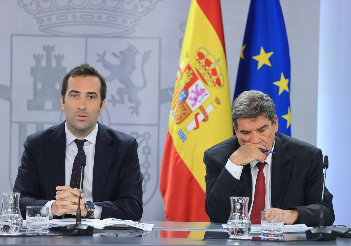 El ministro de Economía, Carlos Cuerpo, y el gobernador del Banco de España, José Luis Escrivá