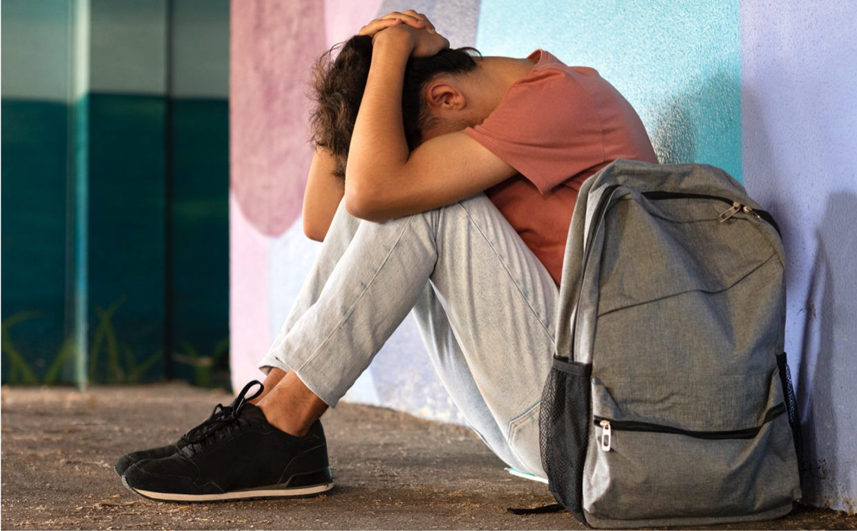 Un adolescente en foto de archivo