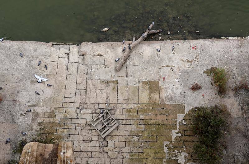 La sequía del Guadalquivir a su paso por Córdoba, en imágenes