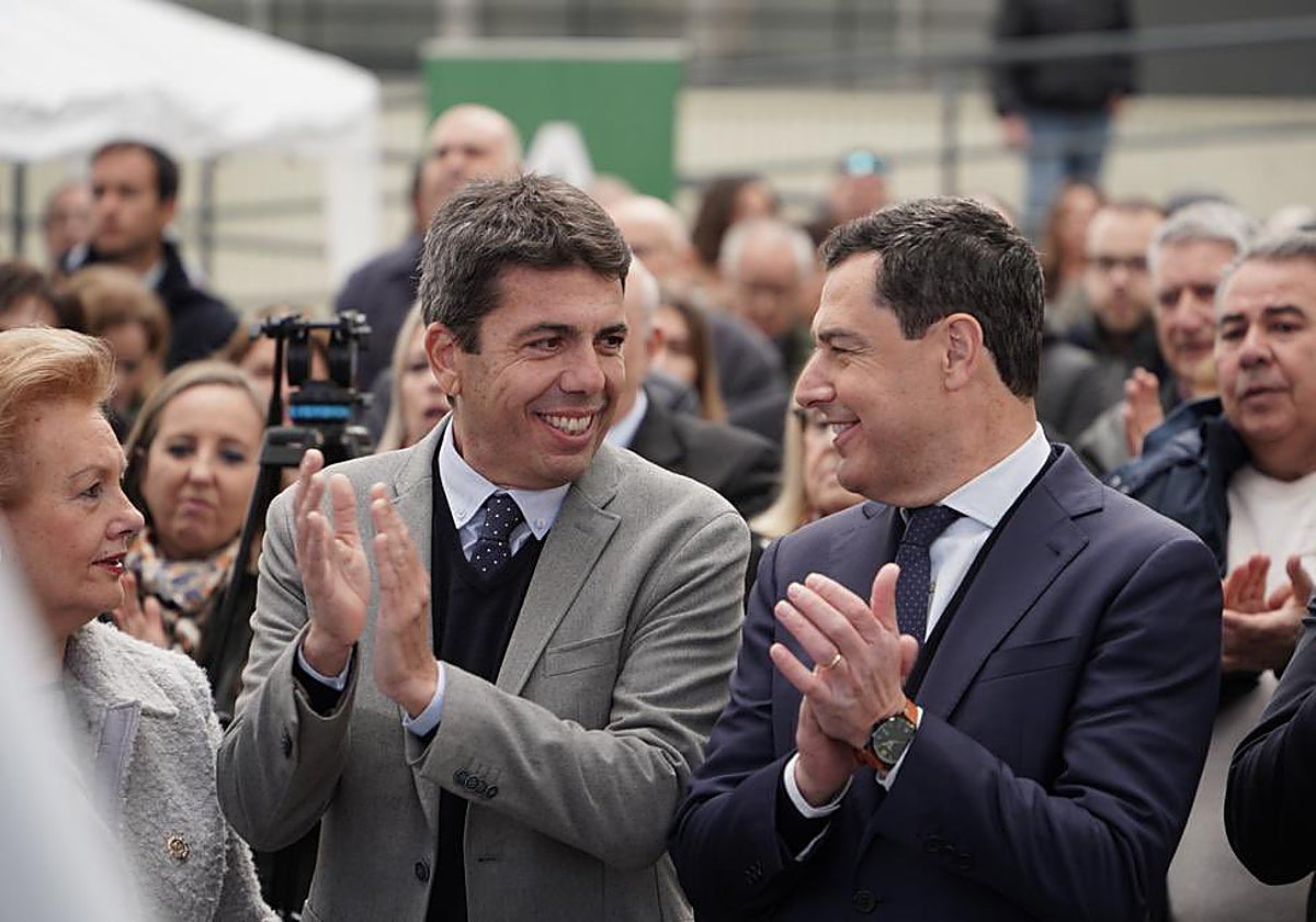 Imagen del presidente del PPCV, Carlos Mazón, y el presidente de la Junta de Andalucía, Juanma Moreno Bonilla