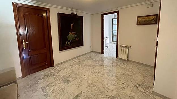 Grn hall de entrada al ático en venta en la Arruzafilla por 525.000 euros