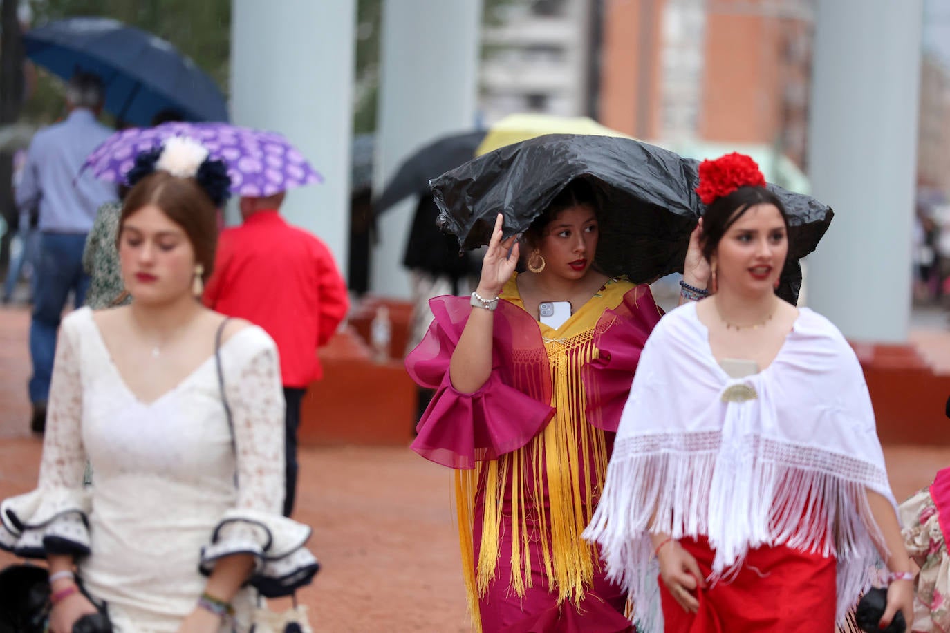 La Feria de Córdoba bajo la lluvia en imágenes