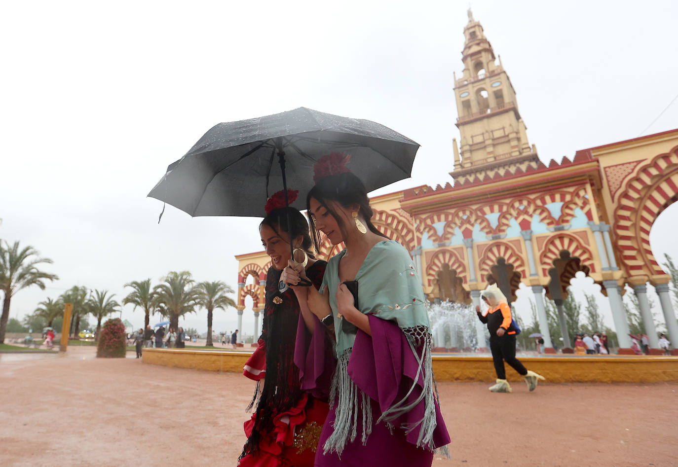 La Feria de Córdoba bajo la lluvia en imágenes