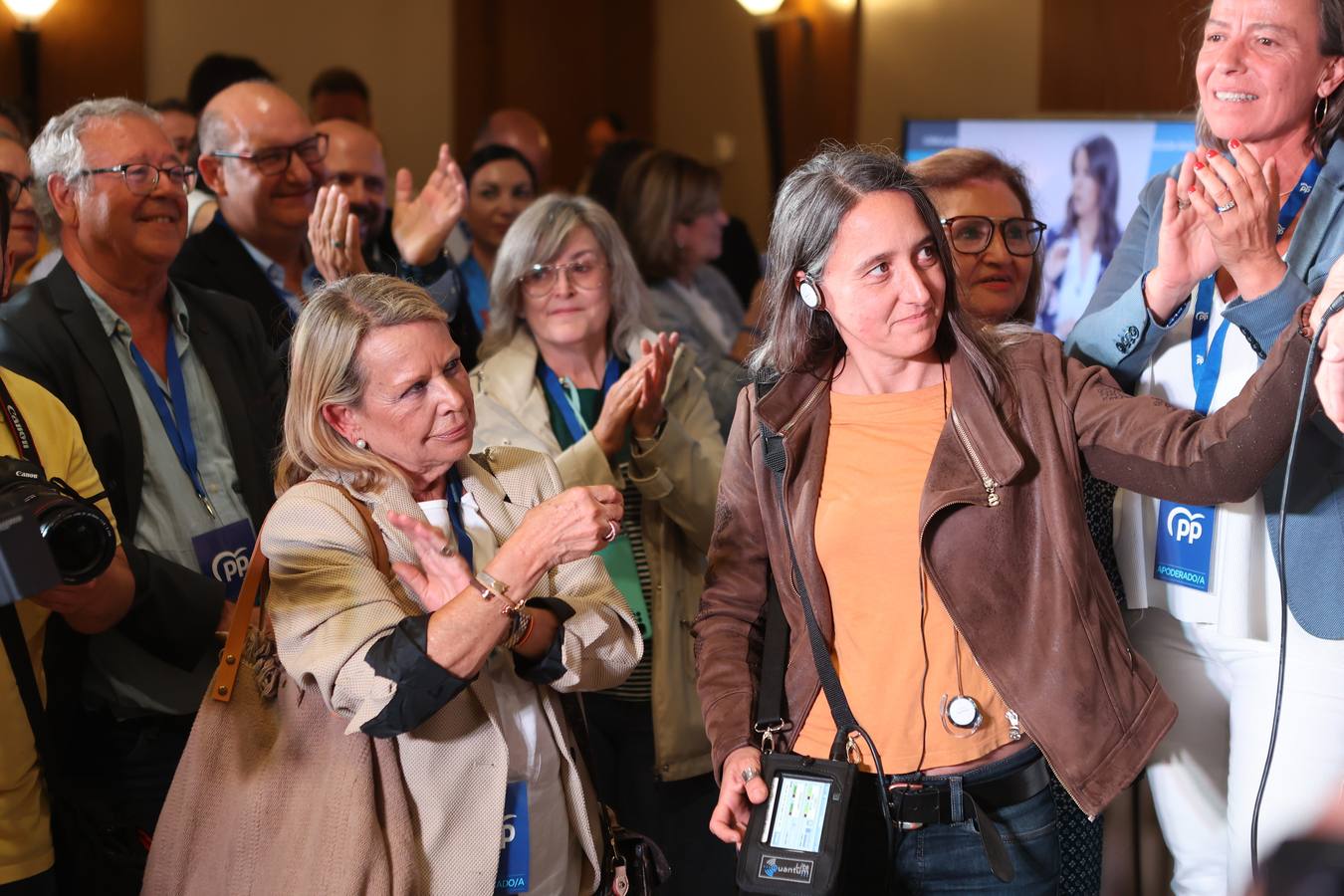 El ambiente electoral en la sede del PP, en imágenes