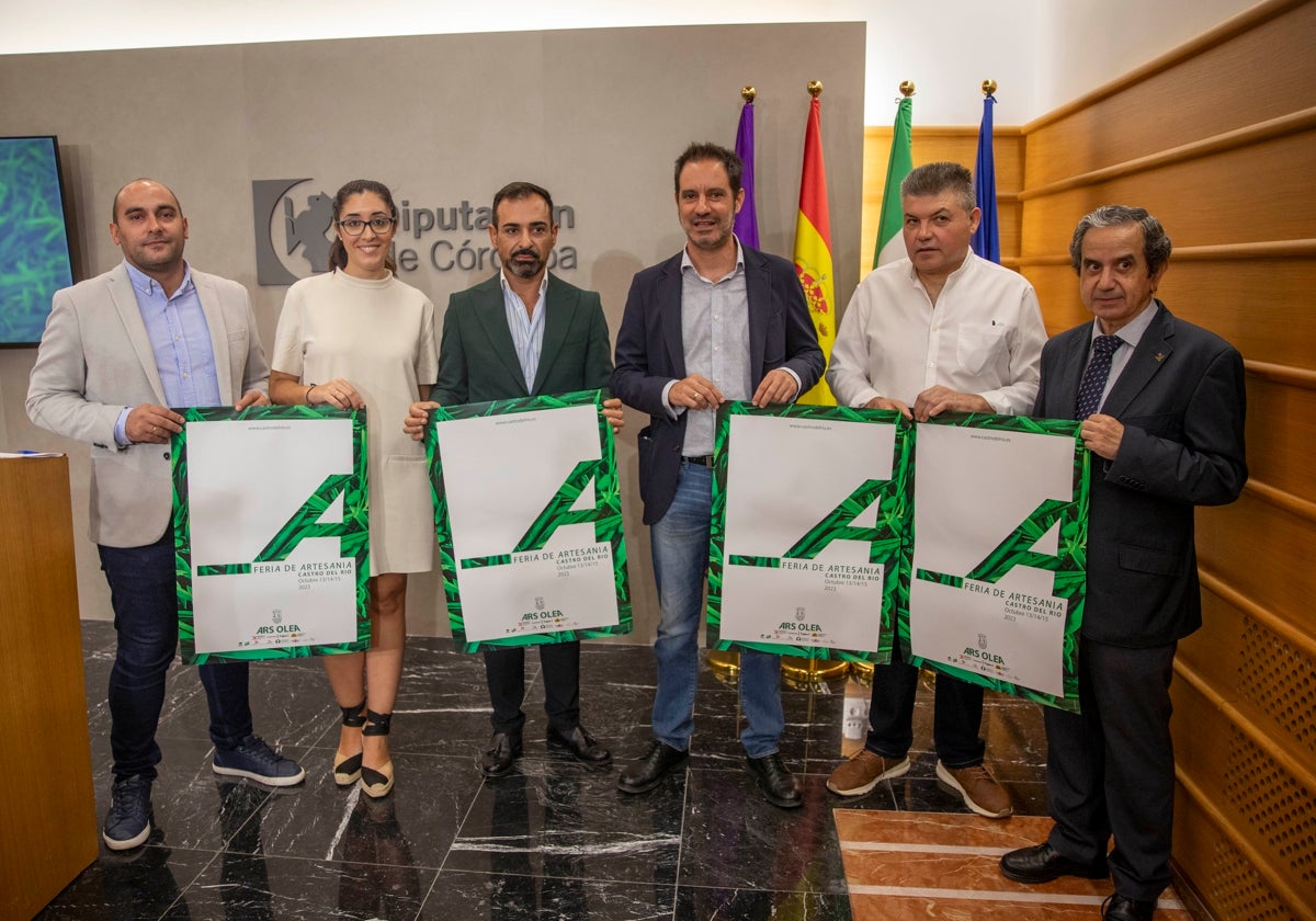 Félix Romero y Julio Criado, en el centro, durante la presentación de ARs Olea en la Diputación de Córdoba