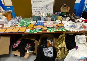 Hallan decenas de medicamentos sospechosos entre falsa ropa de lujo en una tienda china de Usera