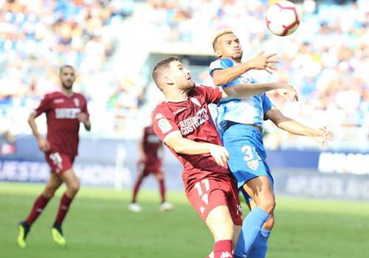 En una acción del Málaga CF-Córdoba CF  en La Rosaleda