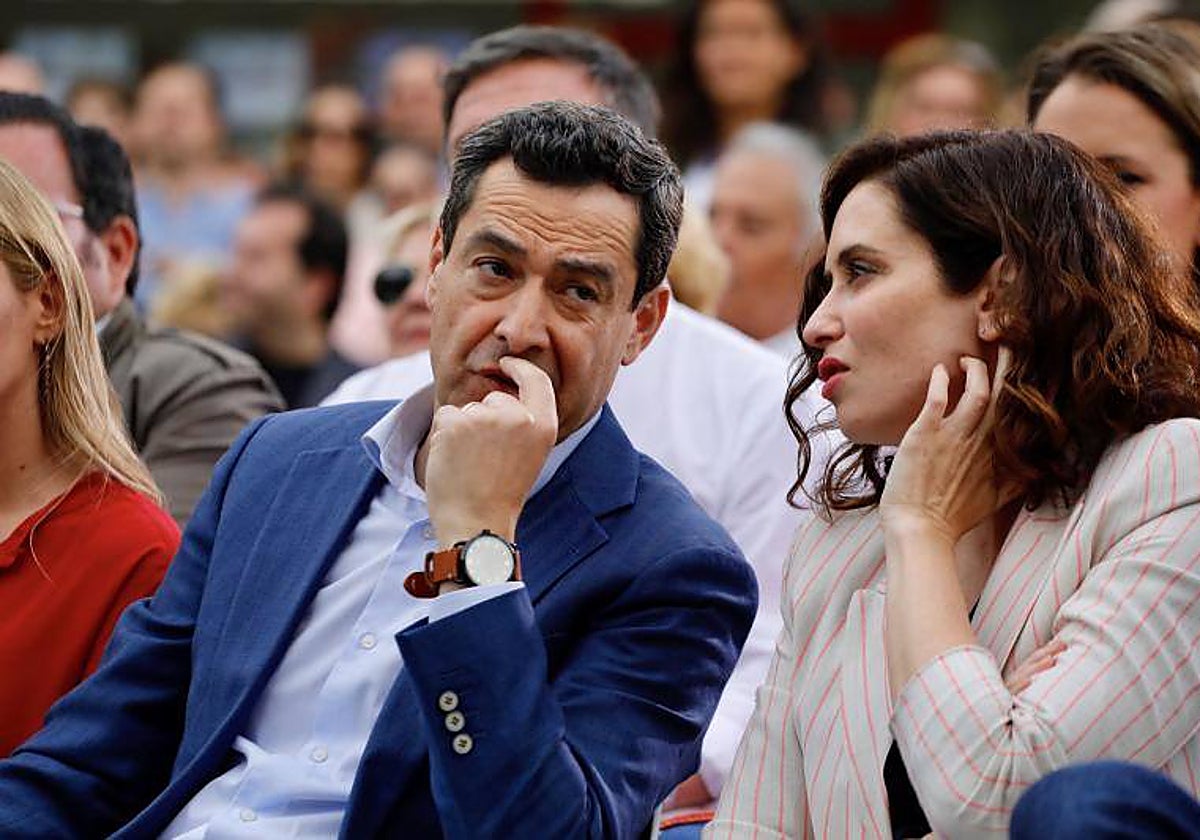 El presidente andaluz, Juanma Moreno, y la presidenta de Madrid, Isabel Díaz Ayuso