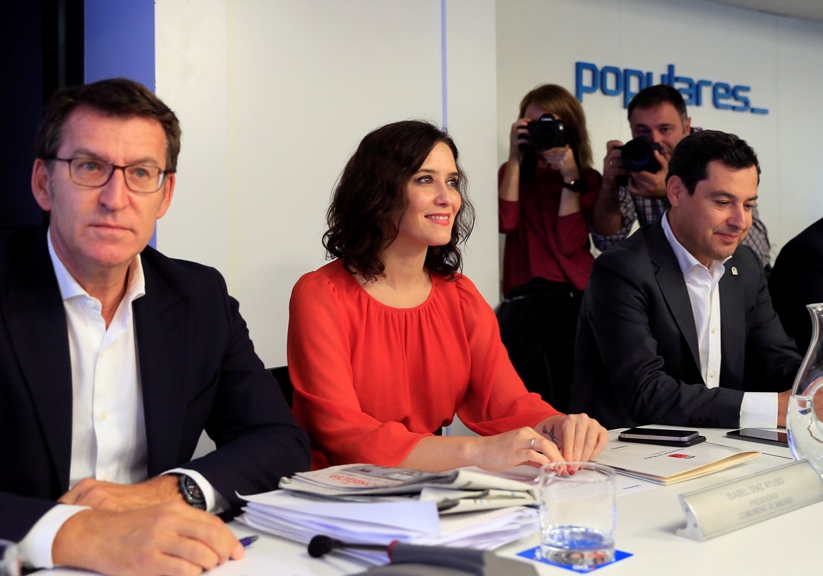 Núñez Feijóo, Díaz Ayuso y Moreno Bonilla en la sede del PP en una reunión del Comité Ejecutivo Nacional de 2019