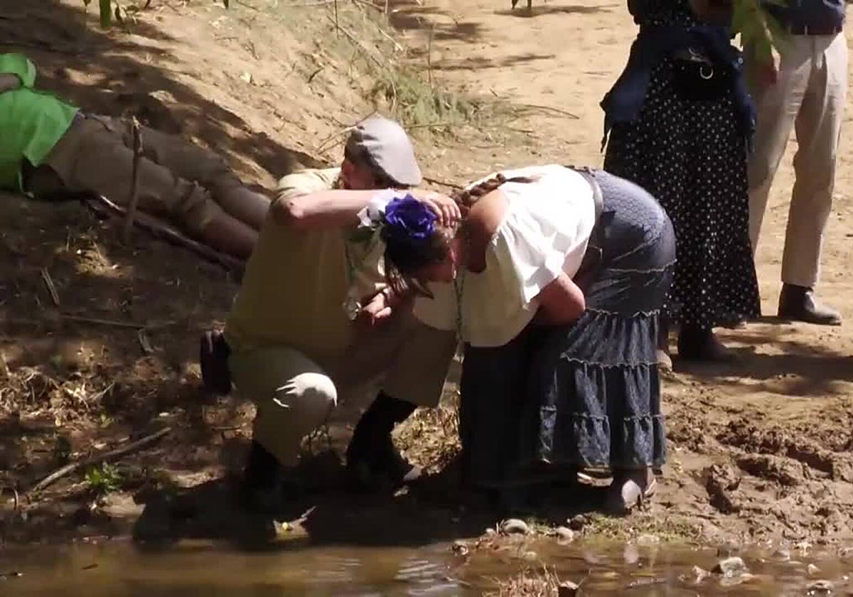 Momento de un bautismo rociero en el Vado del Quema