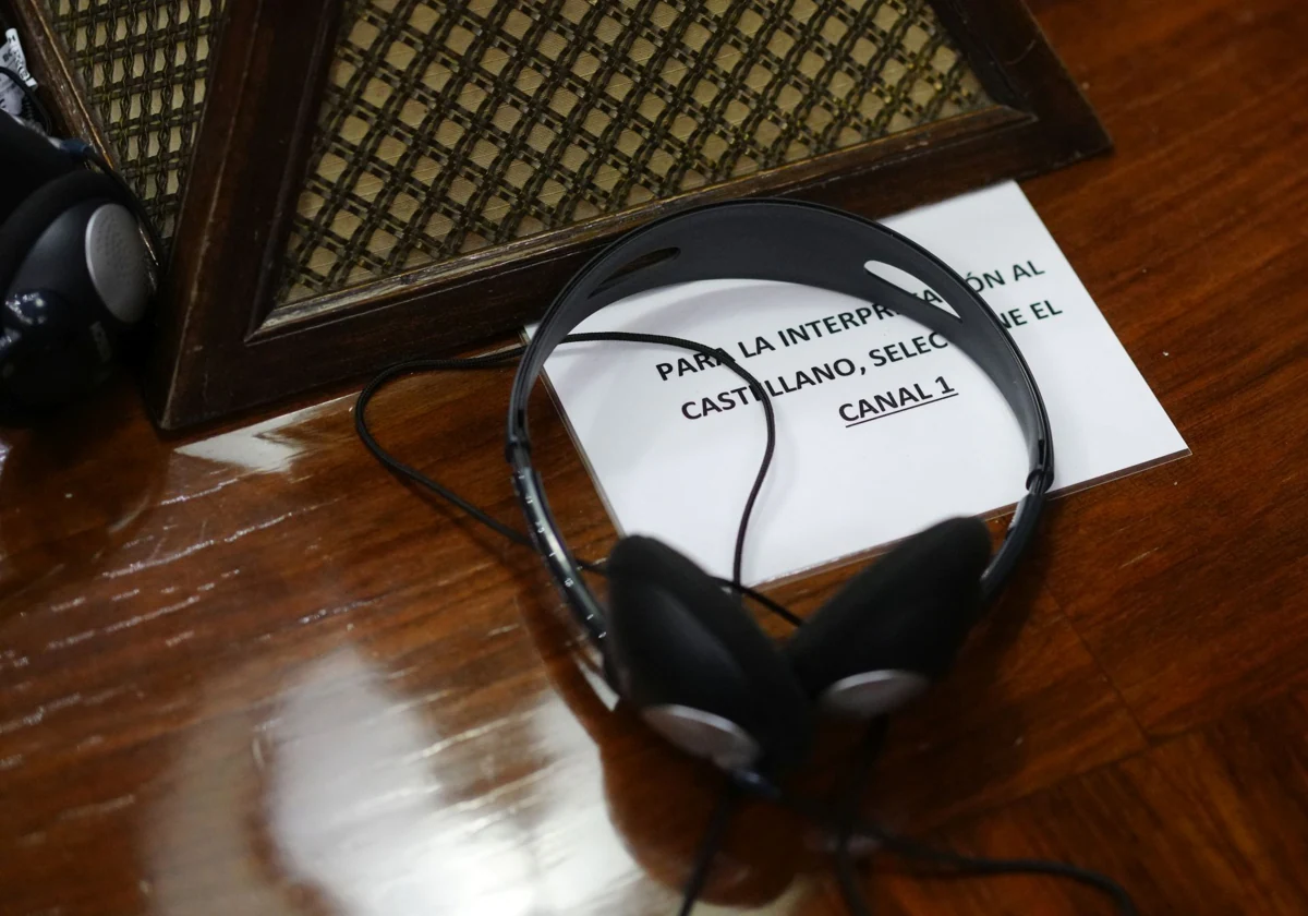 Auriculares del Congreso, con instrucciones para la traducción