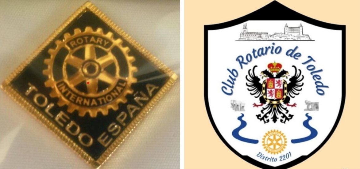 Insignia y banderín del Rotary Club de Toledo, Distrito 2201. Su refundación se produjo oficialmente en 2012. En la actualidad tiene su sede en el histórico restaurante Venta de Aires
