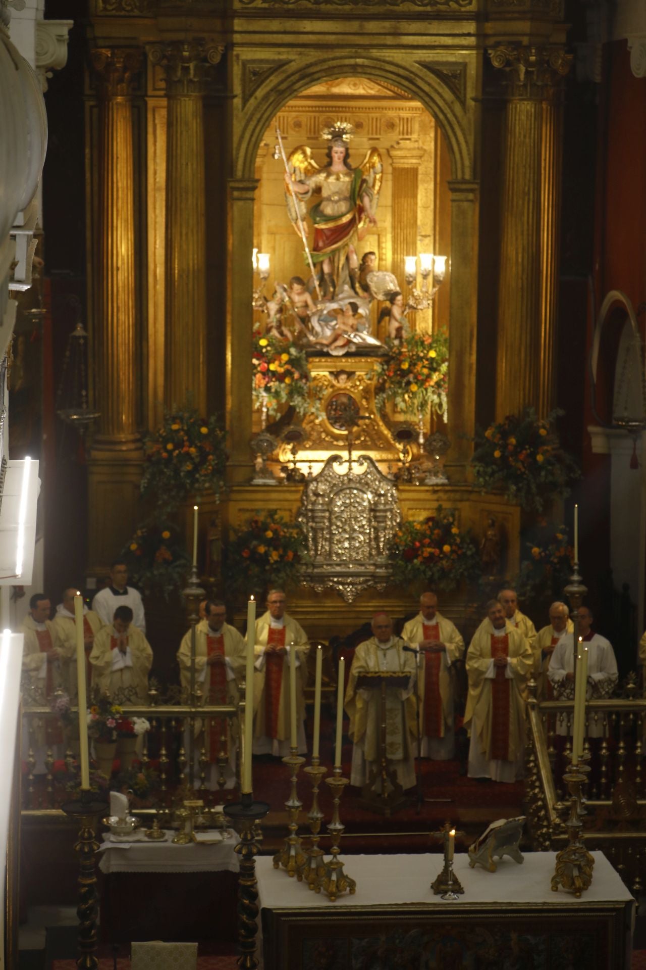 La tradicional misa de San Rafael en la iglesia del Juramento, en imágenes