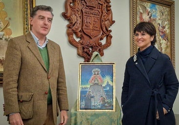 Santiago Padilla y Nuria Barrera, junto al cartel anunciador