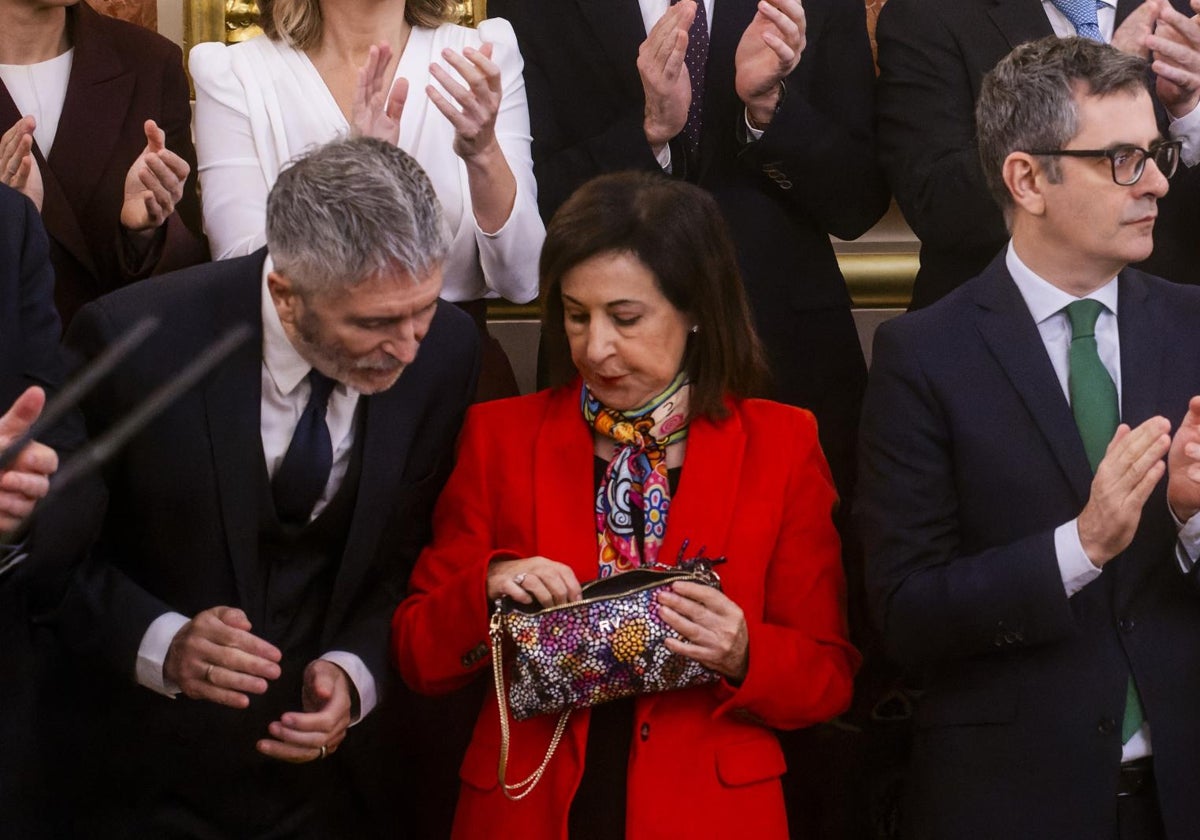 Imagen de los ministros Fernando Grande Marlaska y Margarita Robles