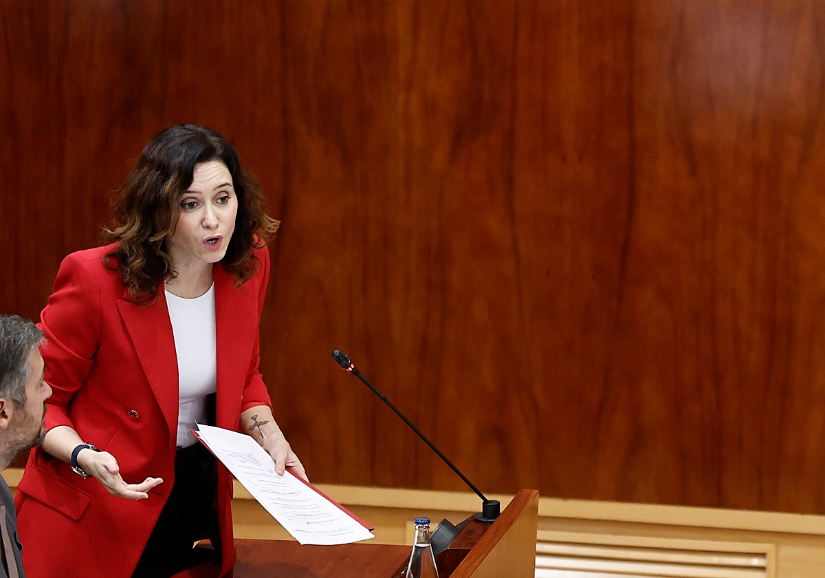 La presidenta de la comunidad de Madrid, Isabel Díaz Ayuso, interviene en el pleno de la Asamblea de Madrid este jueves