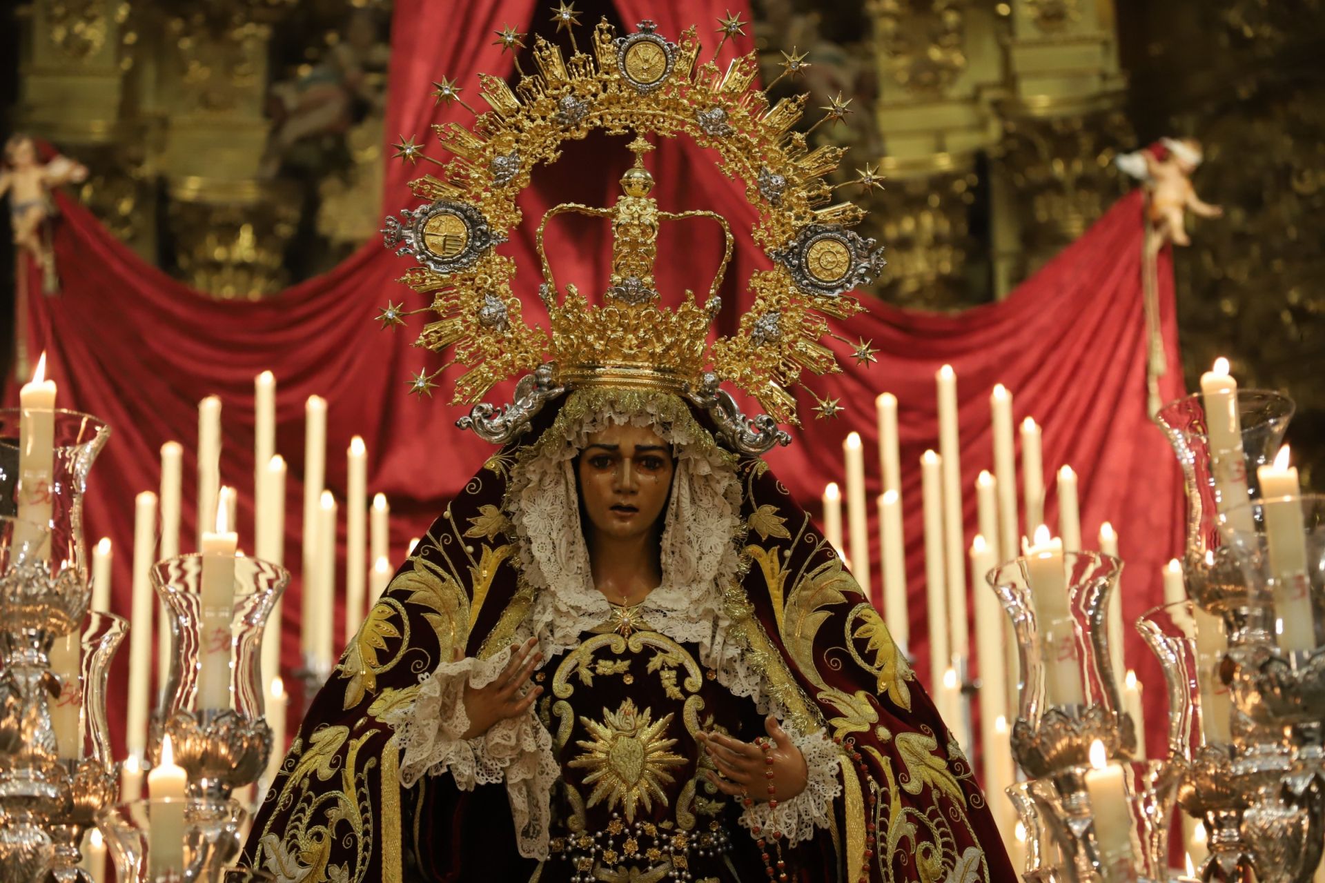 La misa y el rosario vespertino con la Virgen de la Candelaria de Córdoba, en imágenes