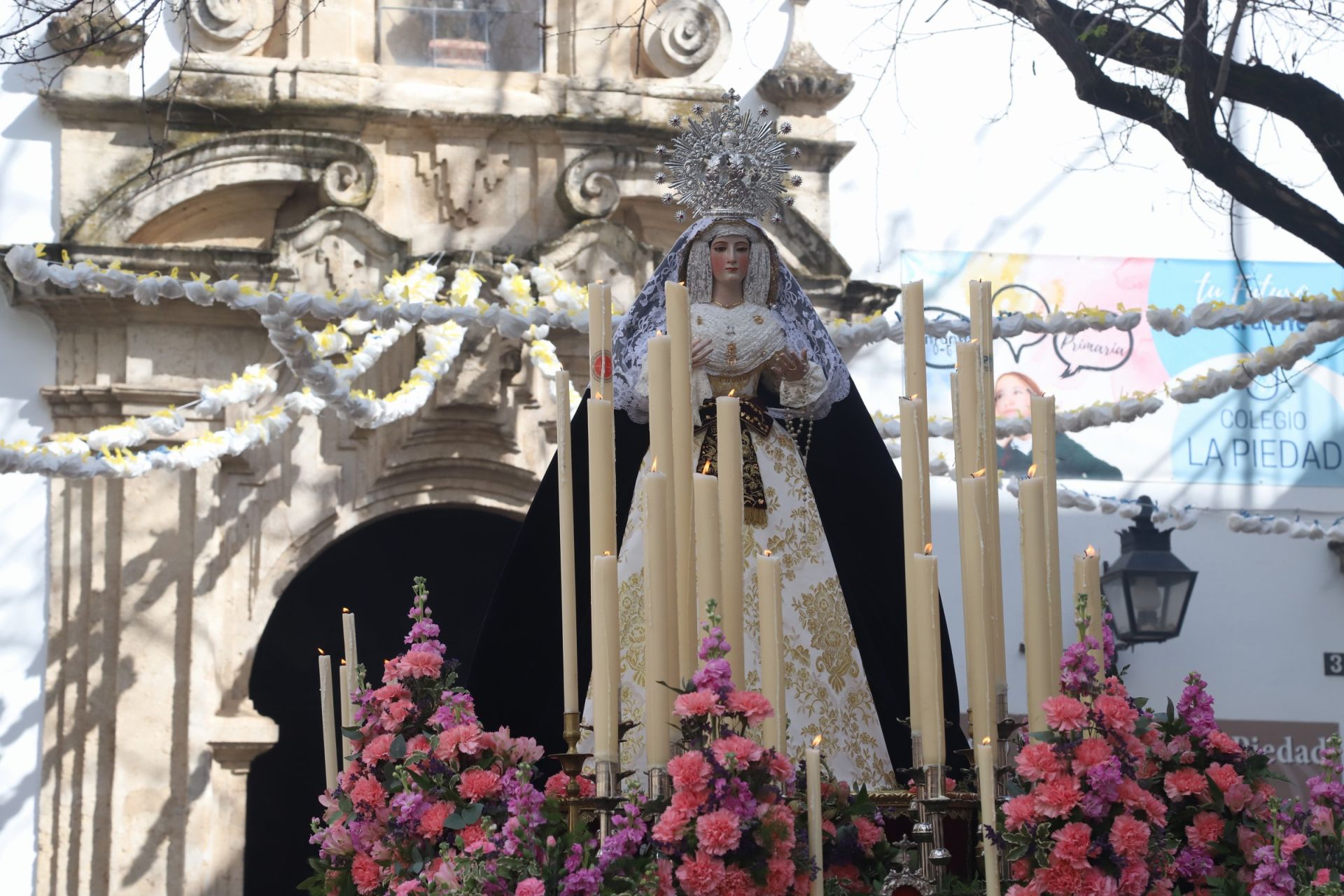 La tradicional procesión del colegio de la Piedad de Córdoba, en imágenes