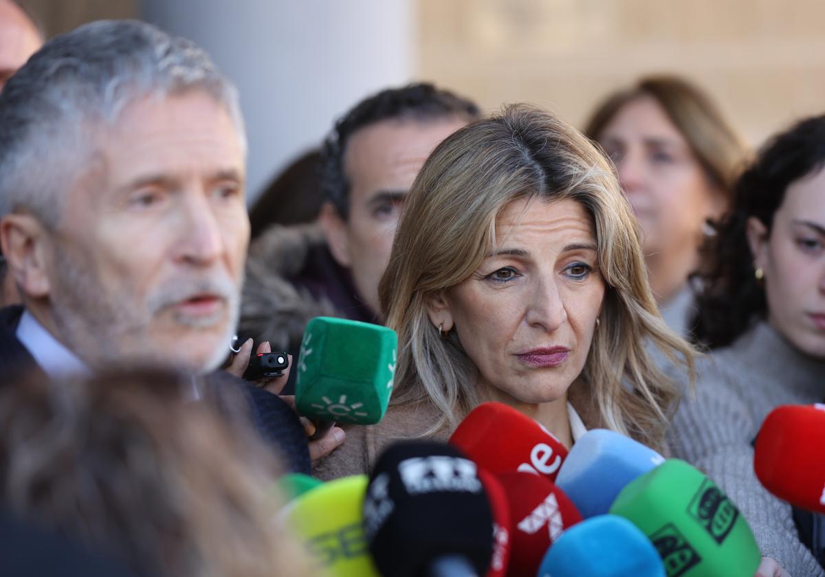 Yolanda Díaz, junto a Fernando Grande Marlaska.