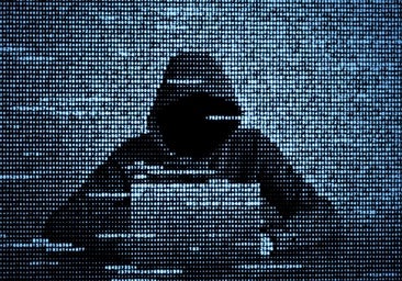 Ilustración con un 'hacker' ante su ordenador