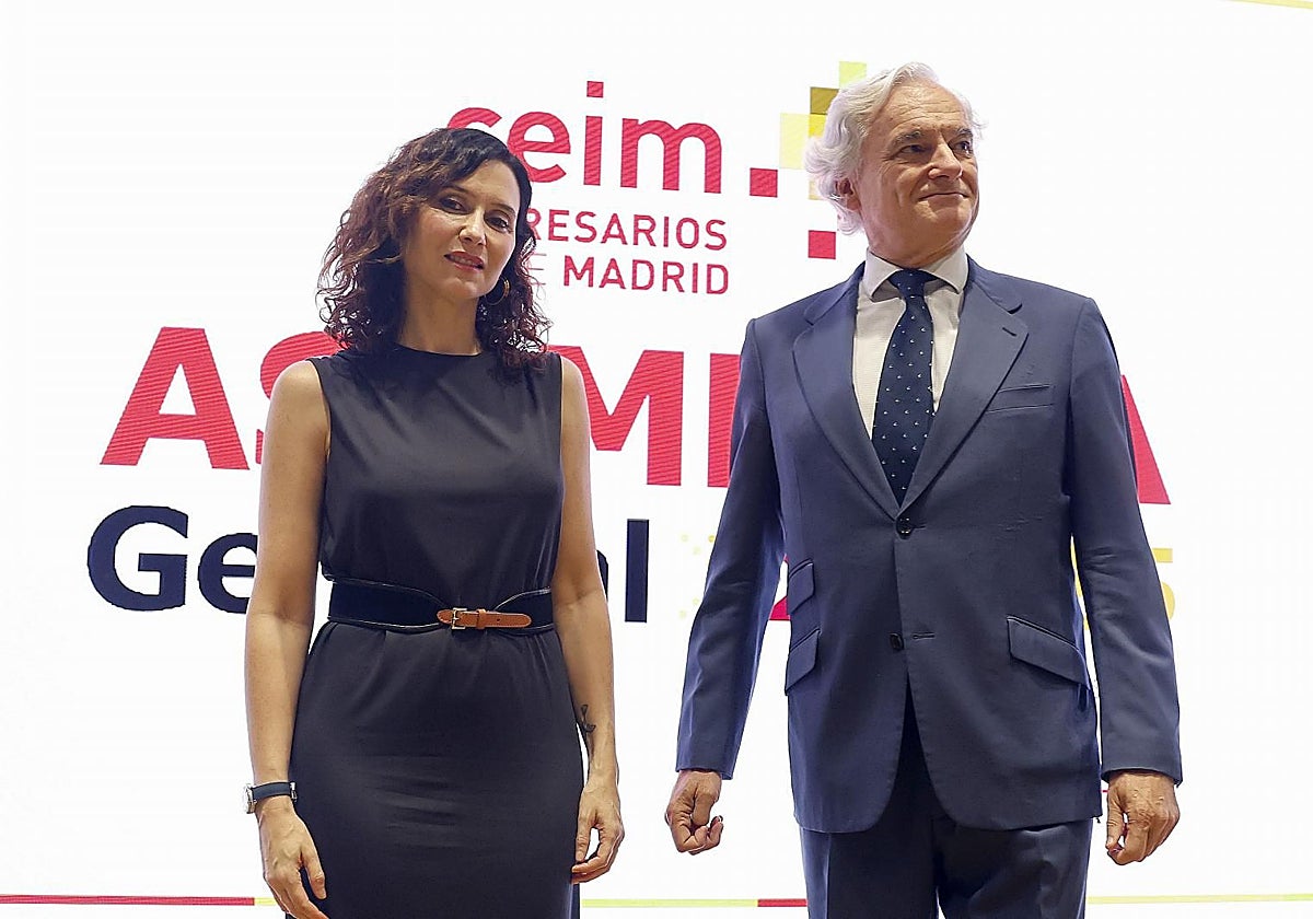 Isabel Díaz Ayuso y Miguel Garrido, en la clausura de la Asamblea de los empresarios madrileños