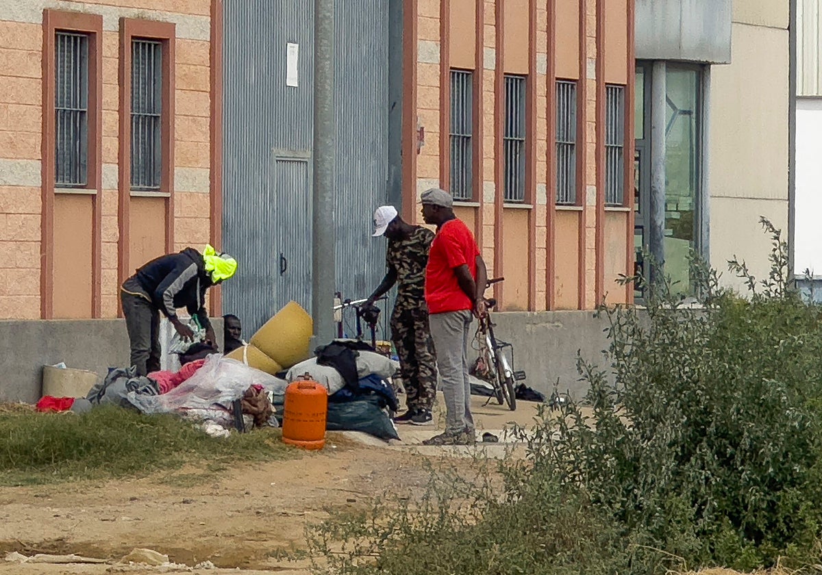 Inmigrantes en un asentamiento