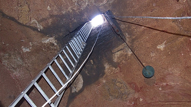 The metal stairs to access the interior of the tank