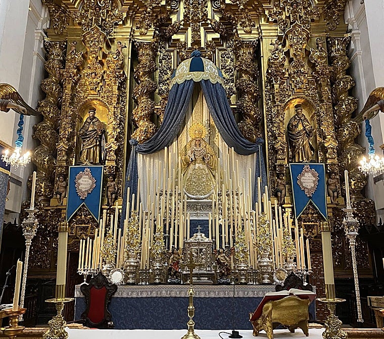 The Virgin of the Trinity on the altar of her worship
