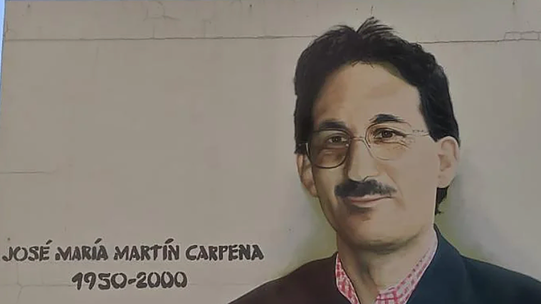 El resultado final del grafiti realizado por el artista urbano Nesui SRC a José María Martín Carpena en la barriada de Los Guindos