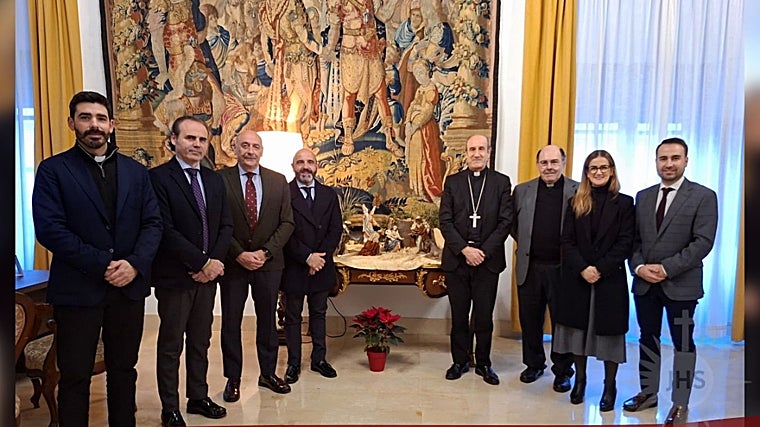 The bishop, with the elder sister and members of the brotherhood