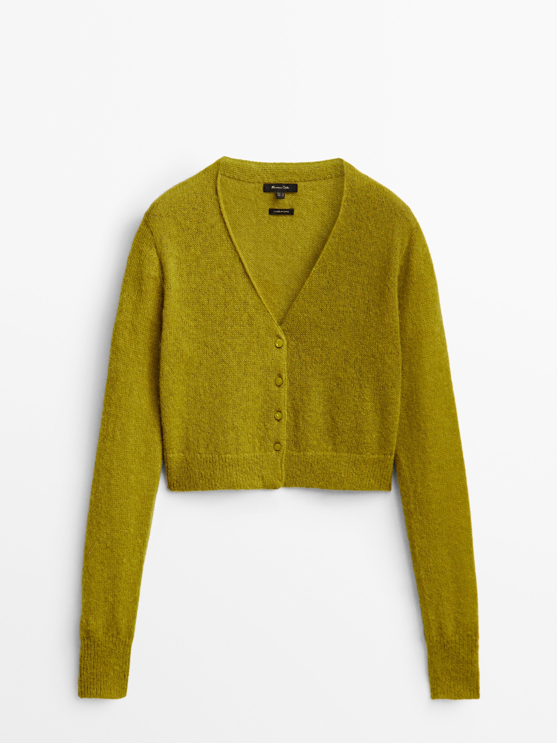 Cárdigan corto con escote a picos y botones: 79,95 euros en Massimo Dutti.