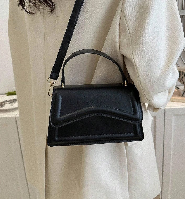 Bolso negro. 7.88 euros en Shein.