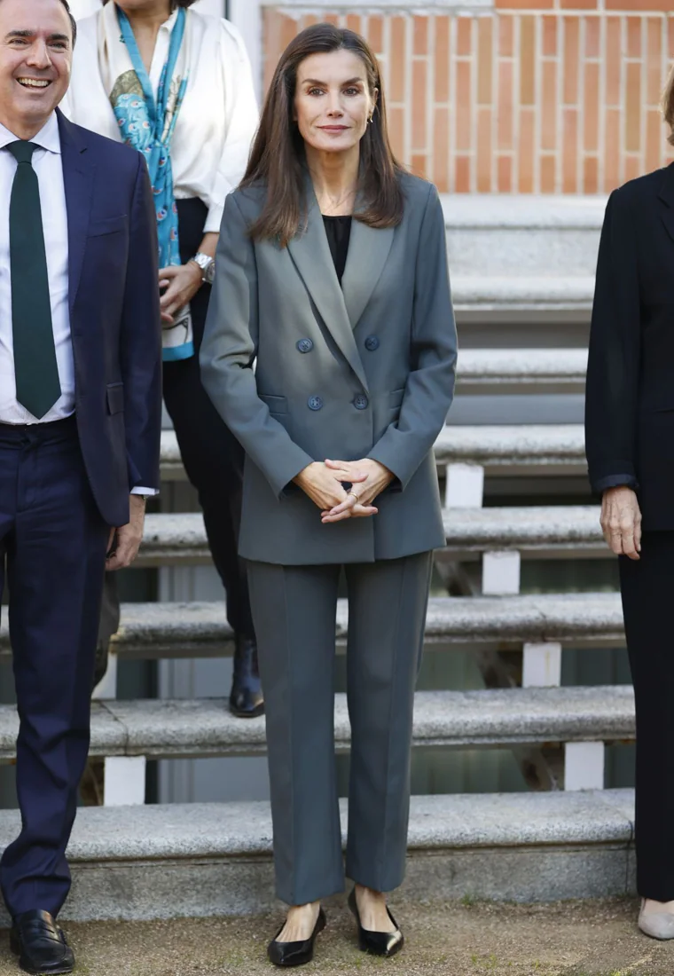 The Queen's look for her audiences at the Royal Palace.