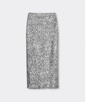 Imagen secundaria 2 - Pantalón de lentejuezas de Calzedonia, desfile de Saint Laurent, pantalón de vinilo de Redondo Brand y vestido de lentejuelas de Bimani; Corsé de Beatriz de la Cámara (735€) y falda de lentejuelas de Bimani (150€)