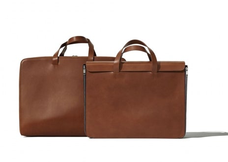 Secondary image 1 - David Bailey jacket, Norman Foster briefcases, and Naomi Campbell zip-up coat