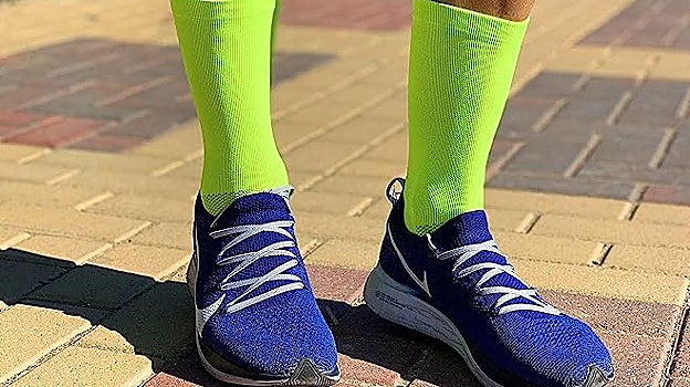 Runner con calcetines verdes