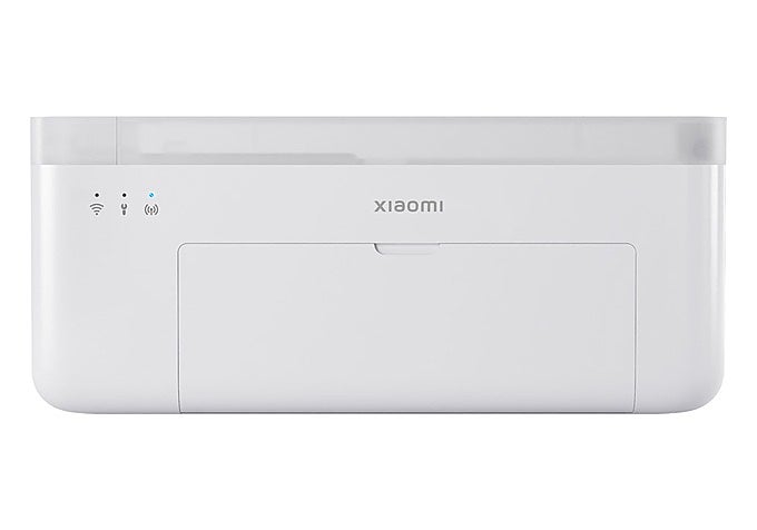 mpresora fotográfica portátil Xiaomi Instant Photo Printer 1S junto a varias copias impresas