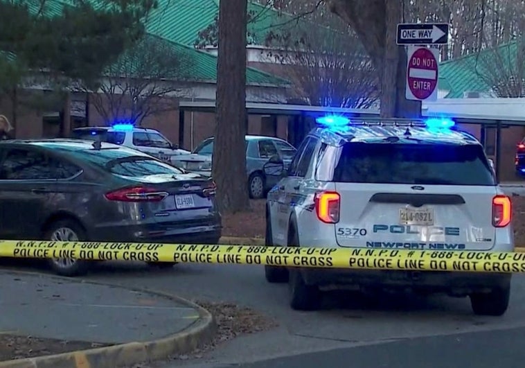 A number of police cars around the school where the events took place