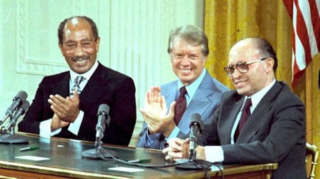 Jimmy Carter, between Anwar Sadat and Menachem Begin during the Camp David Peace Accords