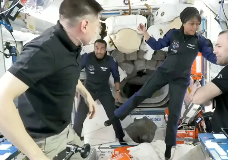 Scientist Rayana Barnawi and astronaut Ali Al-Qarni arrive at the International Space Station