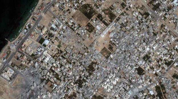 Imagen después - Imagenes satelitales del vecindario de Al Karameh tomadas el 10 de mayo y el 21 de octubre de 2023