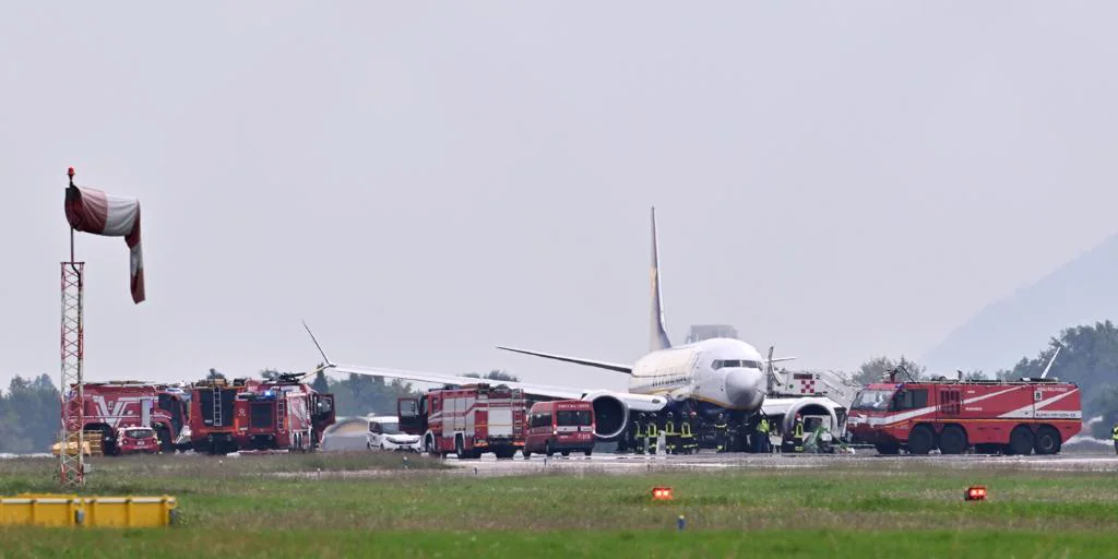 Ryanair plane with 184 passengers evacuated after engine fire in southern Italy