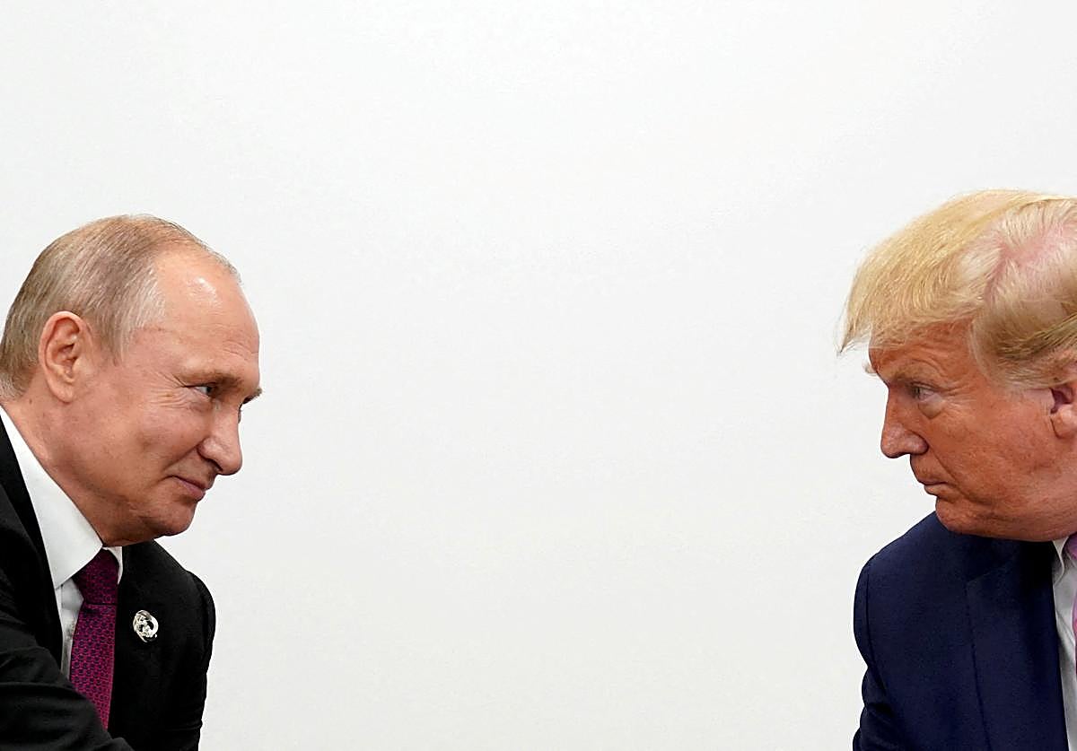 Vladimir Putin y Donald Trump en una reunión de líderes del G20, en 2019