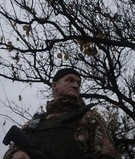 Secondary image 2 - Sitka, driver of the K-2 brigade, during a trip to the Porkrovsk front; anti-drone networks cover the main routes supplying the front; Igor, a member of the K-2 brigade, observes the sky at one point during the trip