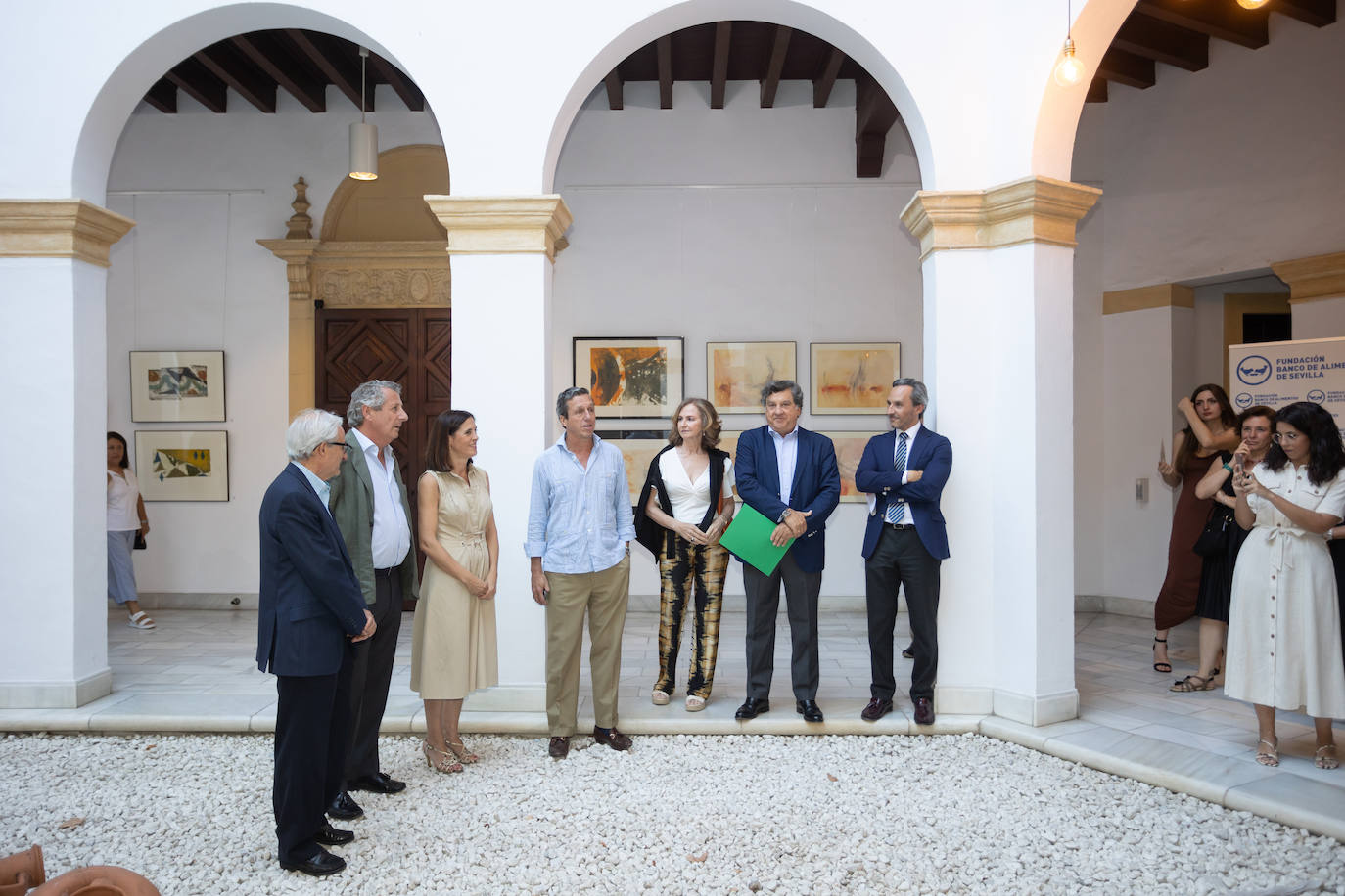 Inauguración de la exposición solidaria de la Fundación La Caixa en Sevilla