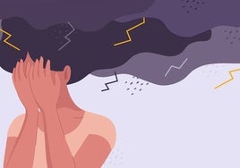Una mujer con dolor de cabeza