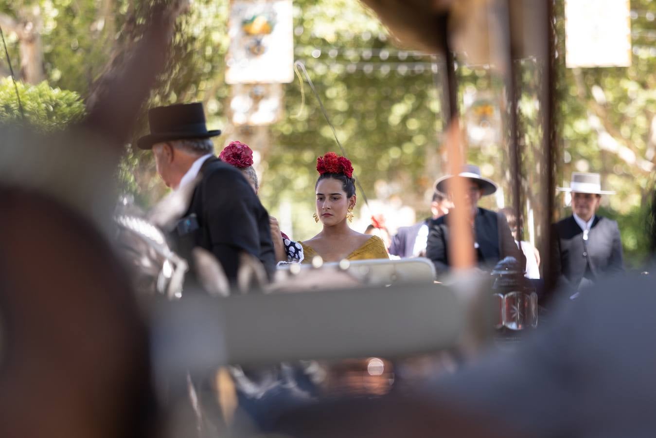 Calor y multitudes este lunes en el real de la Feria